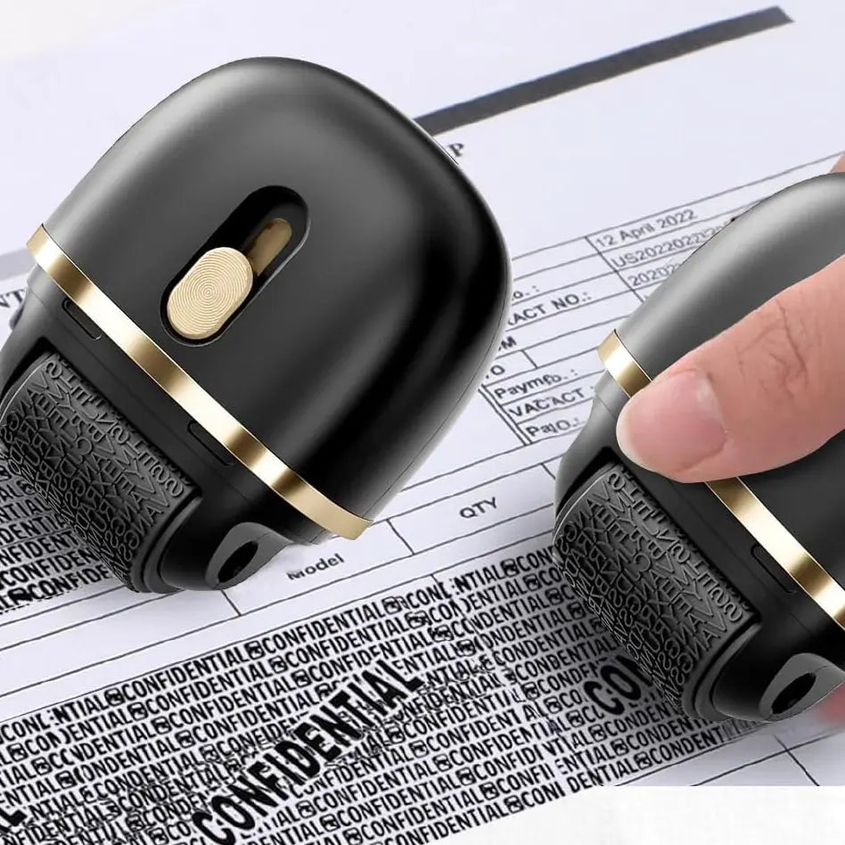 Black and gold device being used to obscure sensitive information on a document.