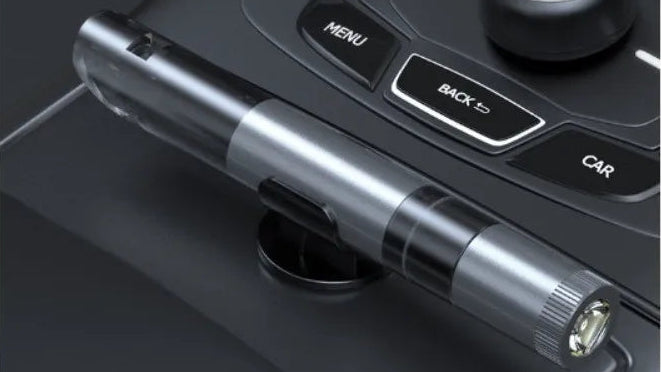 Small cylindrical device on a car dashboard with text 'Mini and simple, can be carried anywhere'.